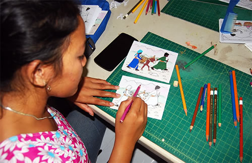      View the full imageRosalyn Patihan coloring a Christmas Card     Rosalyn Patihan coloring a Christmas Card