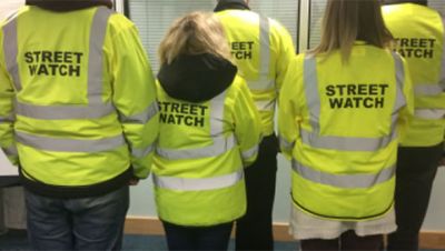 Streetwatch volunteers patrol areas in an effort to deter criminal activity.