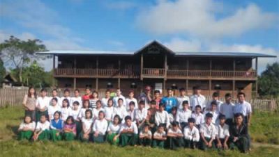 Students in front of boarding house