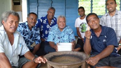 A group of Fijian men sitting around the yaqona bowl