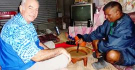 Fr. Frank Hoare drinking yaqona with an Indo-Fijian friend.