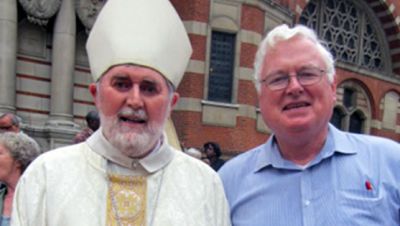 Fr. Peter Hughes (right) at a Mass for Migrants